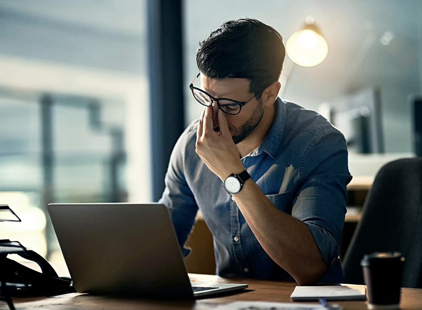 man stressed in office